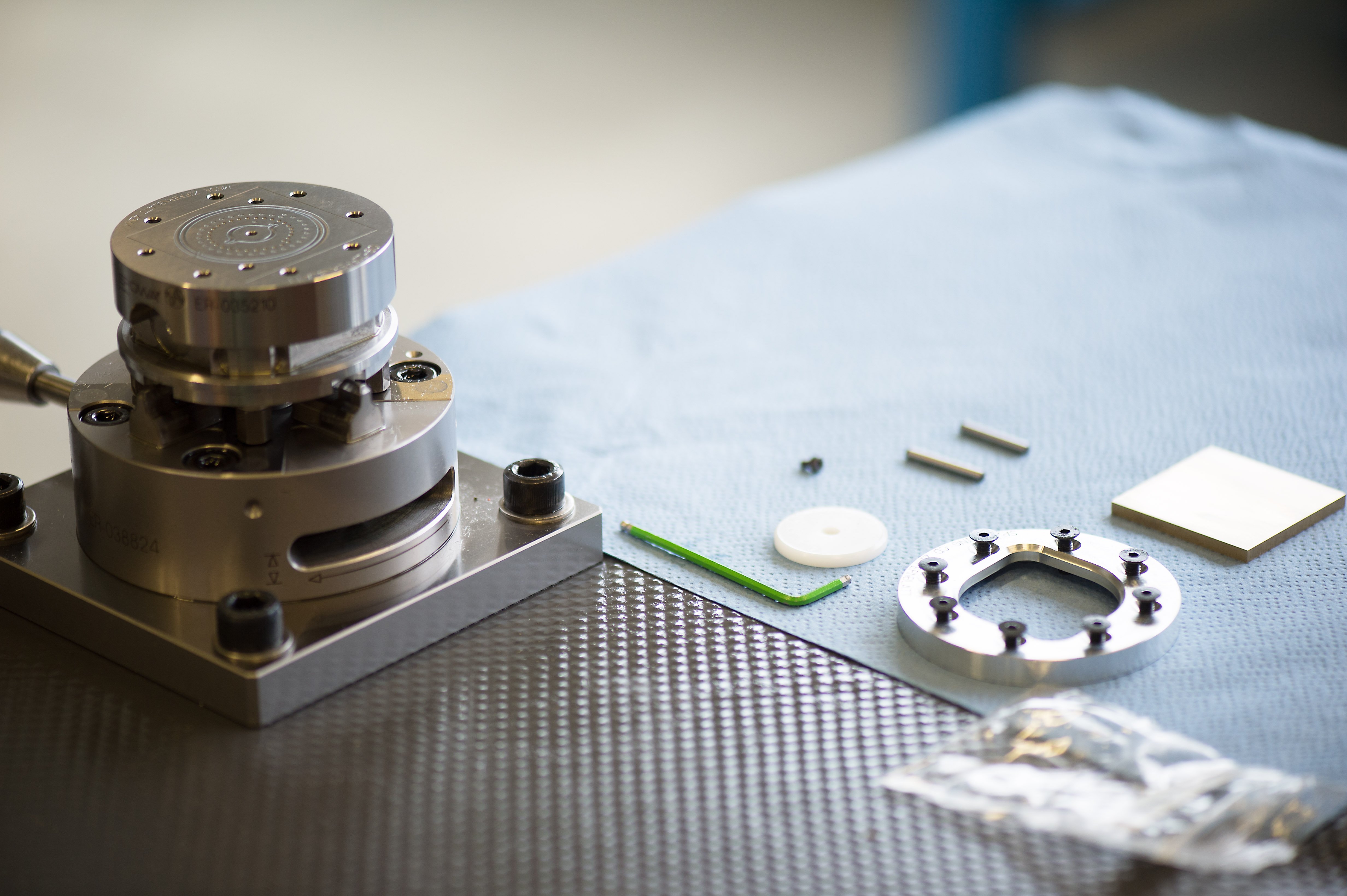 The blank along with the clamping and other devices that we need to manufacture the dial.