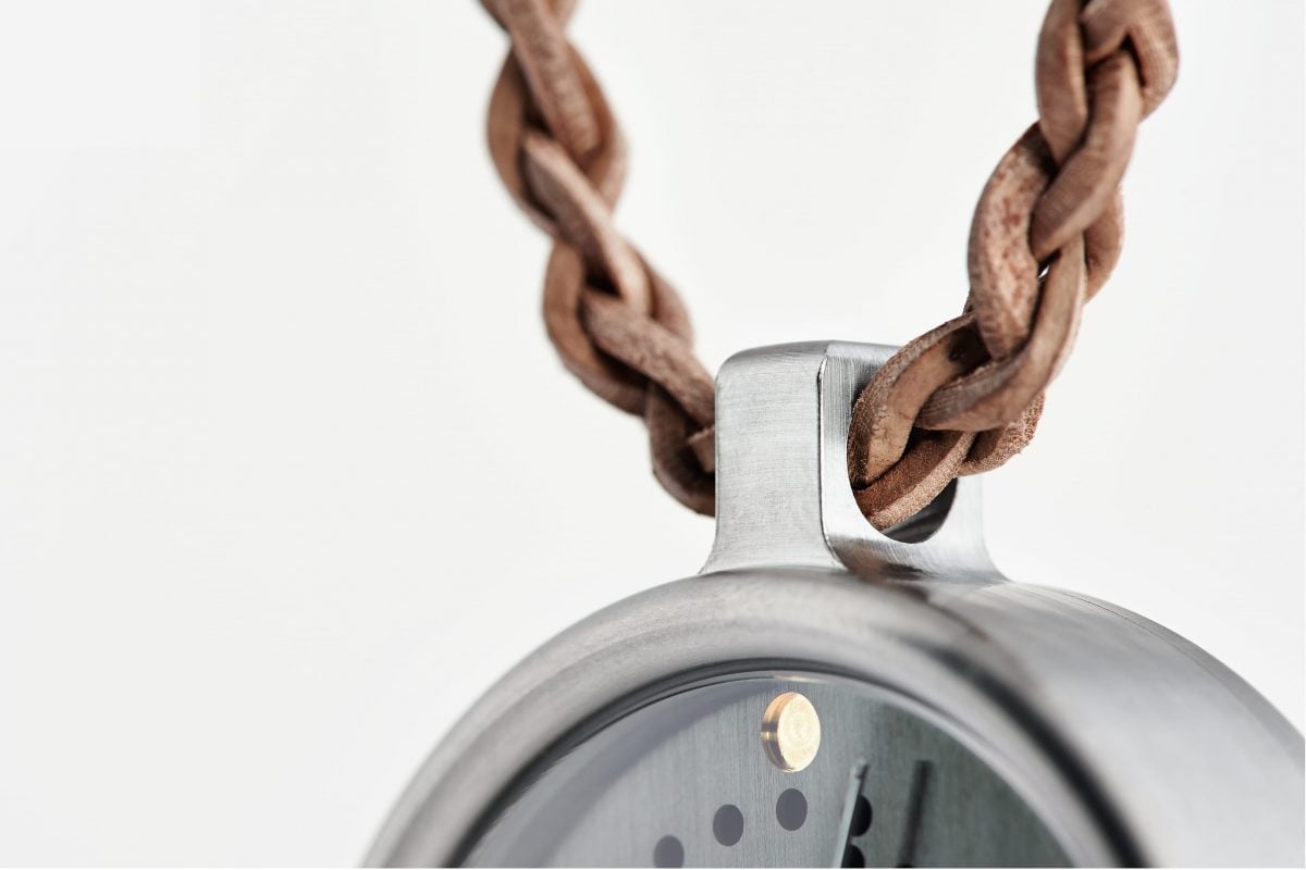 moon phase watch pendant (case in grade 5 titanium with sturgeon leather necklace by ochs und junior, top view)